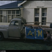 Padre Vic Murrell with the A.I.M. flag displayed on a truck at Grange, South Australia